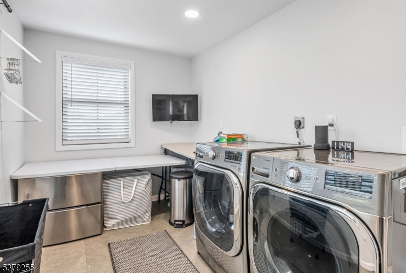 648 Black Oak Ridge Road Wayne, NJ 07470 - Photo 37 of 50 a utility room with dryer and washer