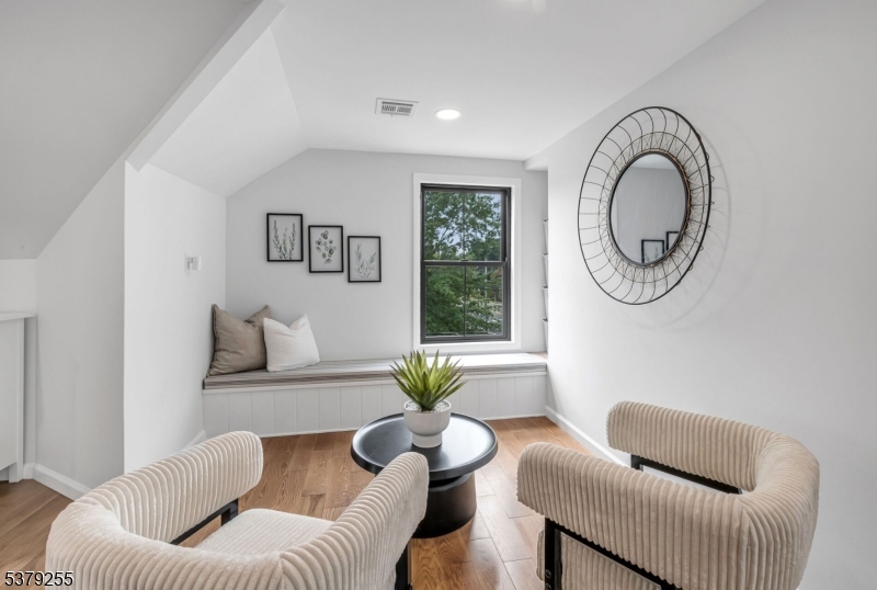 648 Black Oak Ridge Road Wayne, NJ 07470 - Photo 41 of 50 a living room with furniture and a large window