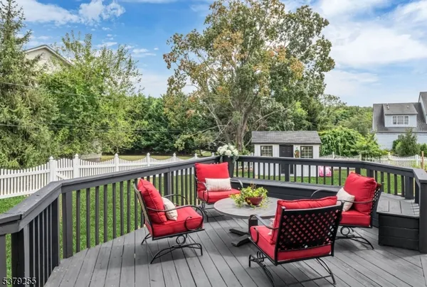 a view of house with outdoor space and garden