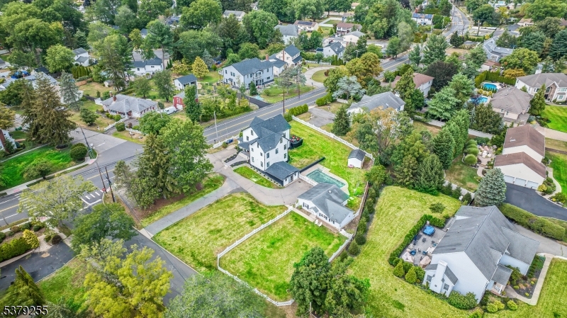 648 Black Oak Ridge Road Wayne, NJ 07470 - Photo 49 of 50 an aerial view of residential houses with outdoor space and trees