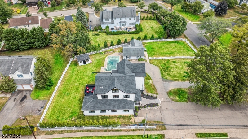 648 Black Oak Ridge Road Wayne, NJ 07470 - Photo 50 of 50 an aerial view of a house with a garden and lake view