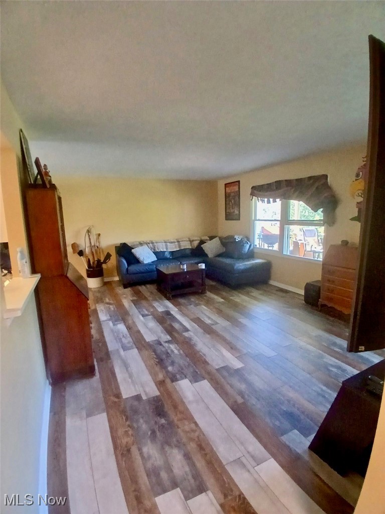 1685 Fattler Ridge Road Philo, OH 43771 - Photo 11 of 24 Living area featuring wood finished floors