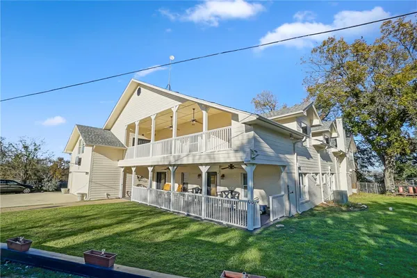 a view of an house with a swimming pool