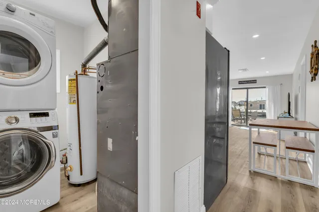 a view of a kitchen and washer and dryer
