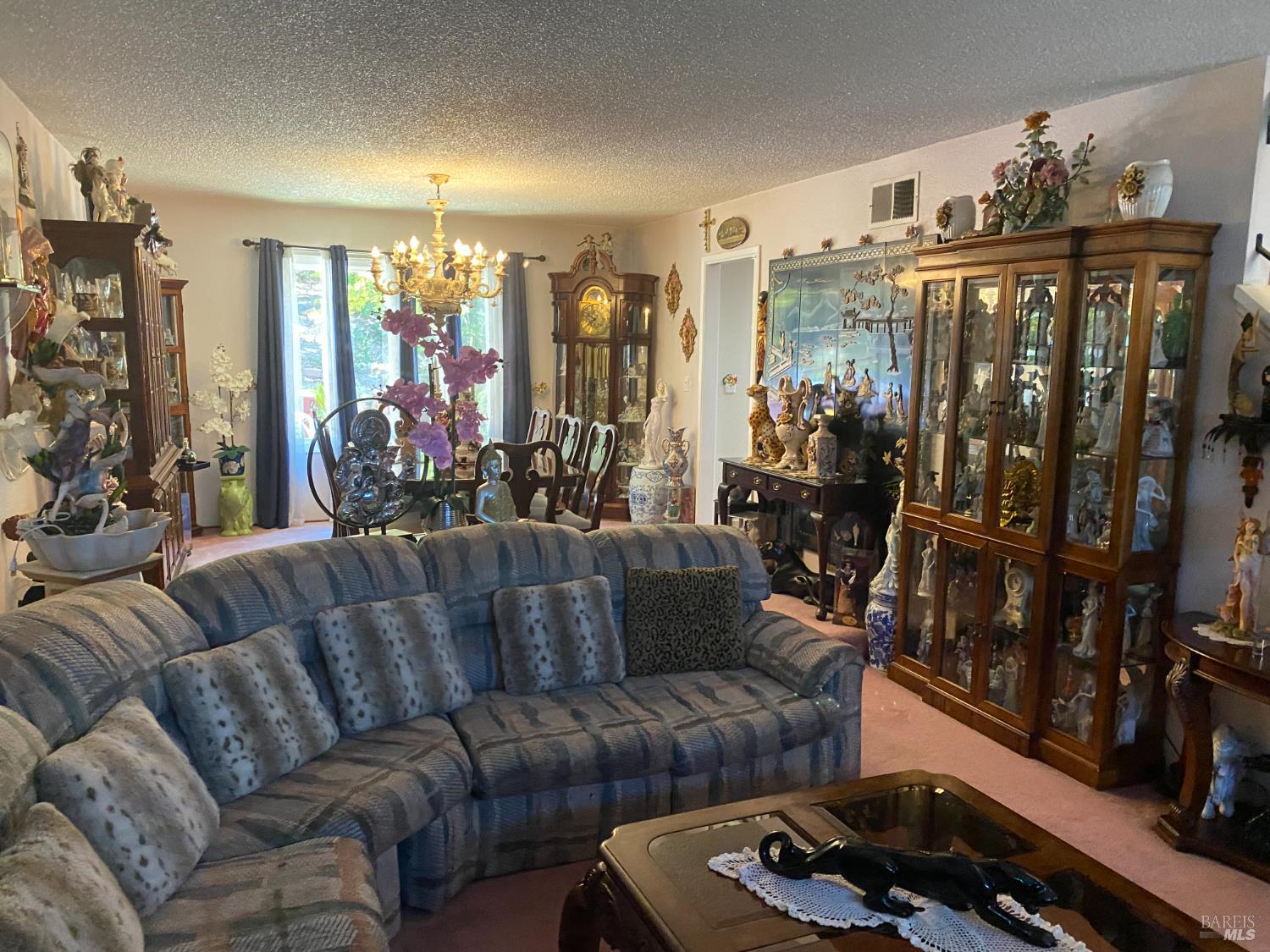 118 Hydrangea Court Vallejo, CA 94591 - Photo 3 of 21 a living room with furniture a lamp and large window