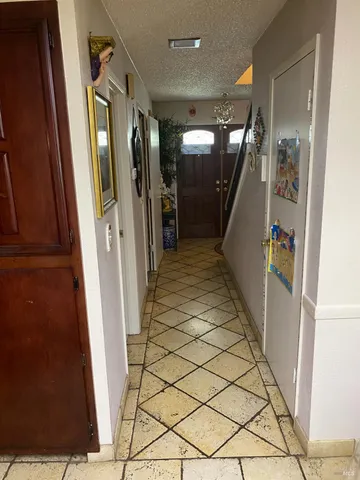 a en suite bathroom with a sink double vanity and a mirror