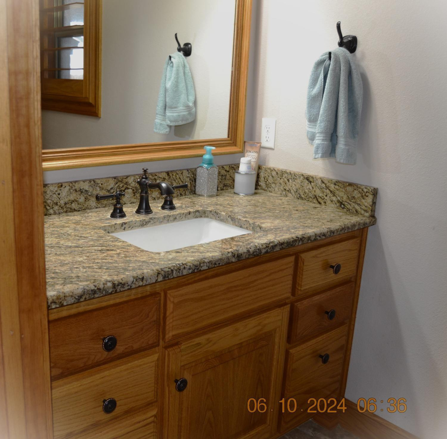 1120 County Road 80 Plainview, TX 79072 - Photo 32 of 47 Bathroom 2 vanity with marble countertop