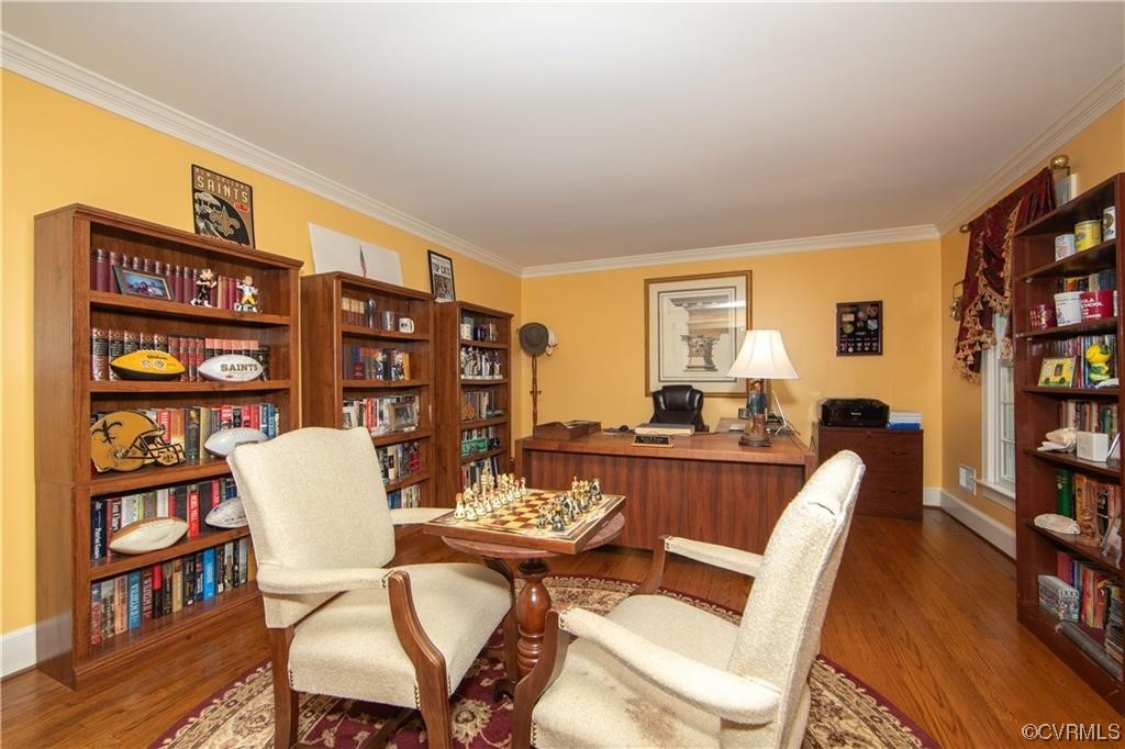 2306 Cranborne Road Midlothian, VA 23113 - Photo 2 of 23 a dining room with furniture and wooden floor