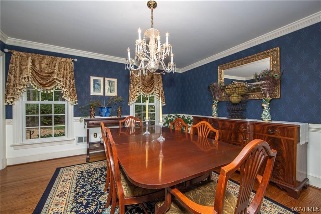 2306 Cranborne Road Midlothian, VA 23113 - Photo 3 of 23 a view of a dining room with furniture window and wooden floor