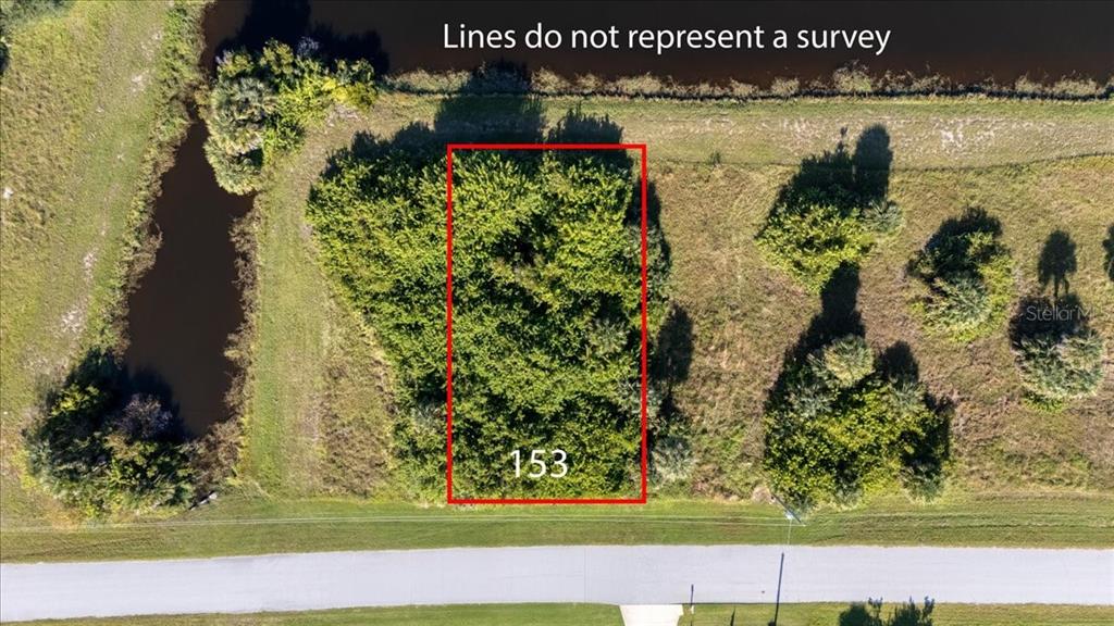 153 Spring Drive Rotonda West, FL 33947 - Photo 4 of 13 a view of a lake