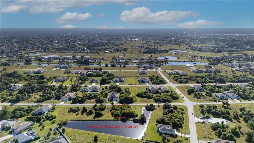 153 Spring Drive Rotonda West, FL 33947 - Photo 5 of 13 an aerial view of multiple house