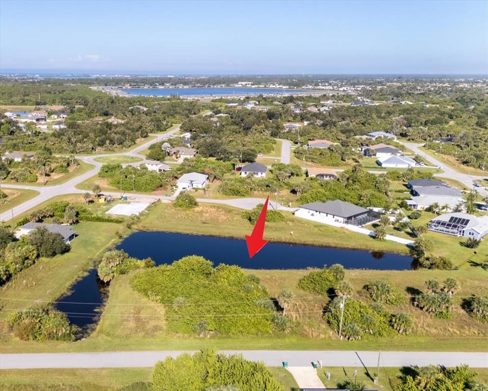 153 Spring Drive Rotonda West, FL 33947 - Photo 7 of 13 a view of lake view and mountain