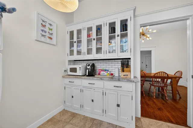 a view of a livingroom with furniture and wooden floor