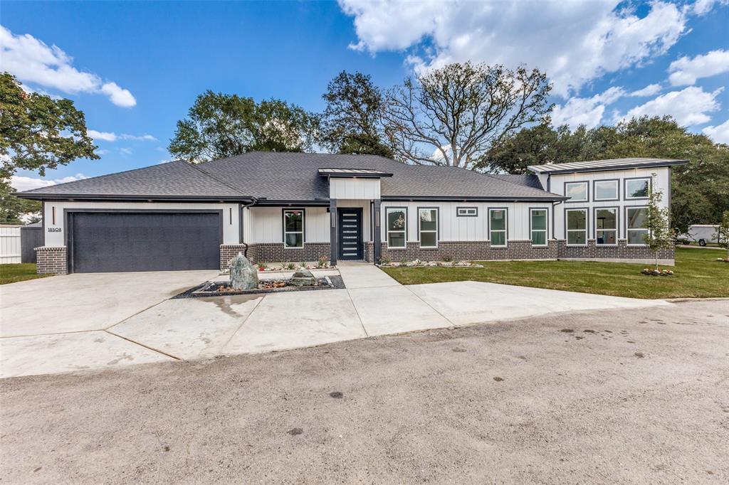 18508 Hickory Circle Kemp, TX 75143 - Photo 2 of 27 a view of a white house with a swimming pool and a chairs