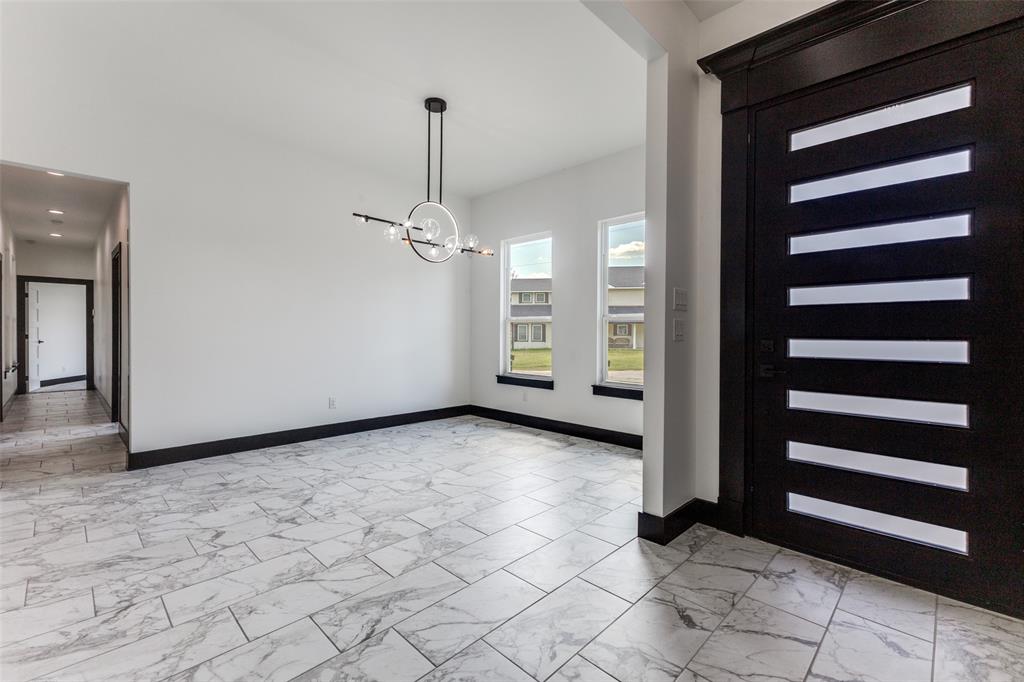 18508 Hickory Circle Kemp, TX 75143 - Photo 8 of 27 a view of a room with a black white checkered floor