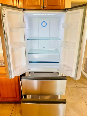 a room with storage and white walls