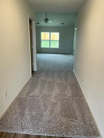 an empty room with a natural light