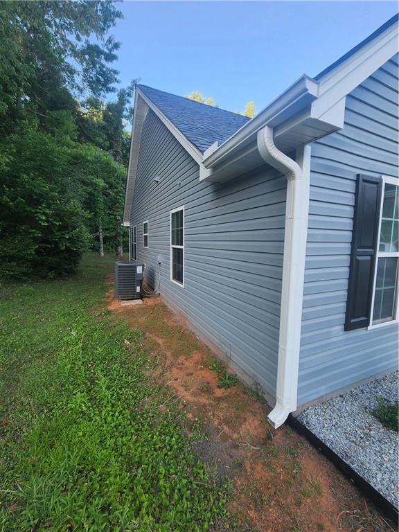 435 Butler Bridge Circle Covington, GA 30016 - Photo 24 of 25 a view of backyard of house with green space
