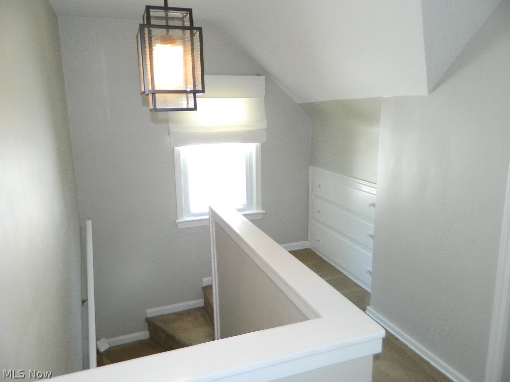 1604 Lyndhurst Road Lyndhurst, OH 44124 - Photo 15 of 35 Let's Go Upstairs - Note the Newer Lighting Fixture, Crisp, Cool Colors, Built In Drawers and Custom Window Treatments!