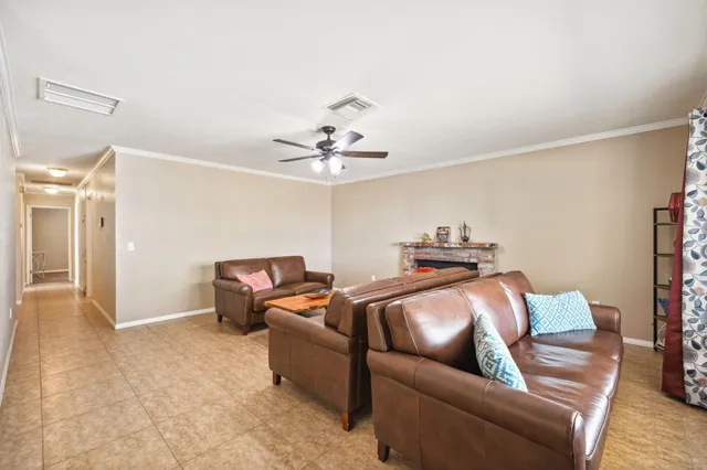 a view of a balcony with furniture