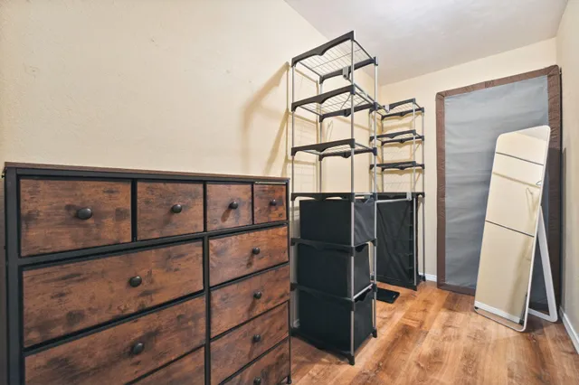 a bathroom with a shower toilet and sink