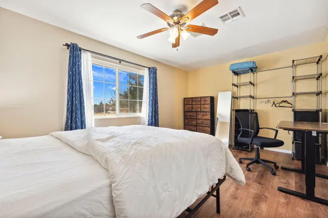 a bathroom with a shower a bathtub and a shower