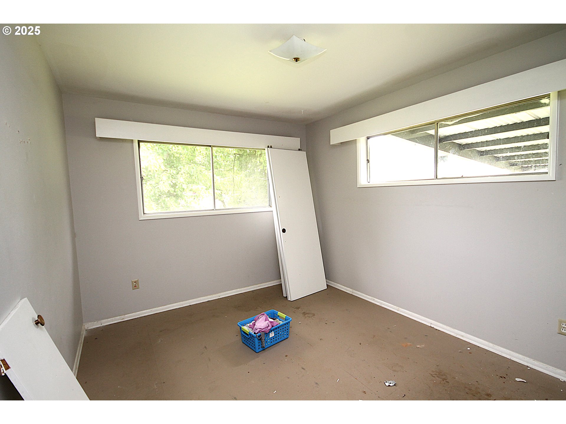 442 Northwest 4th Avenue Canby, OR 97013 - Photo 30 of 39 a view of an empty room with a window
