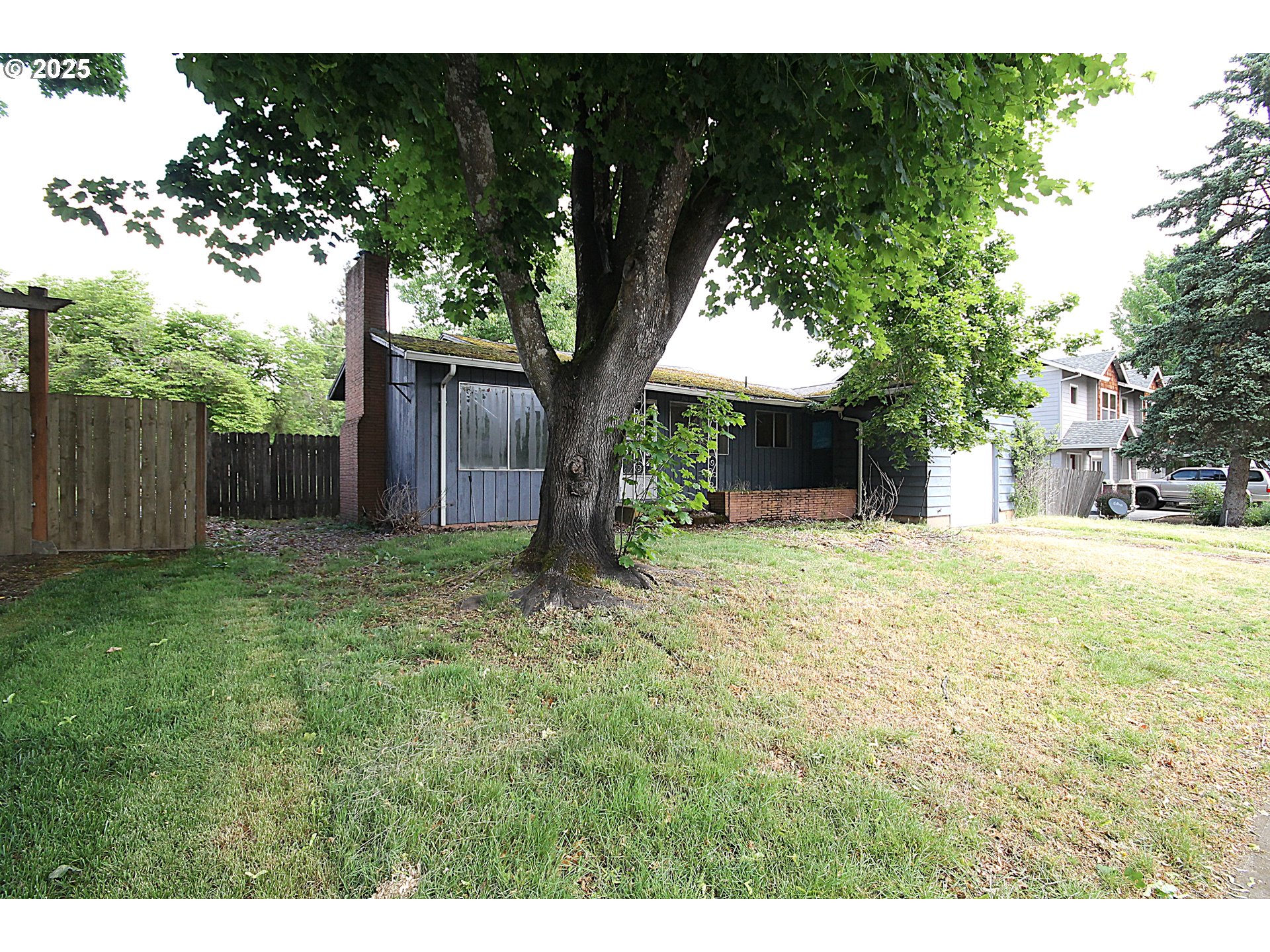 442 Northwest 4th Avenue Canby, OR 97013 - Photo 5 of 39 a view of a house with a yard