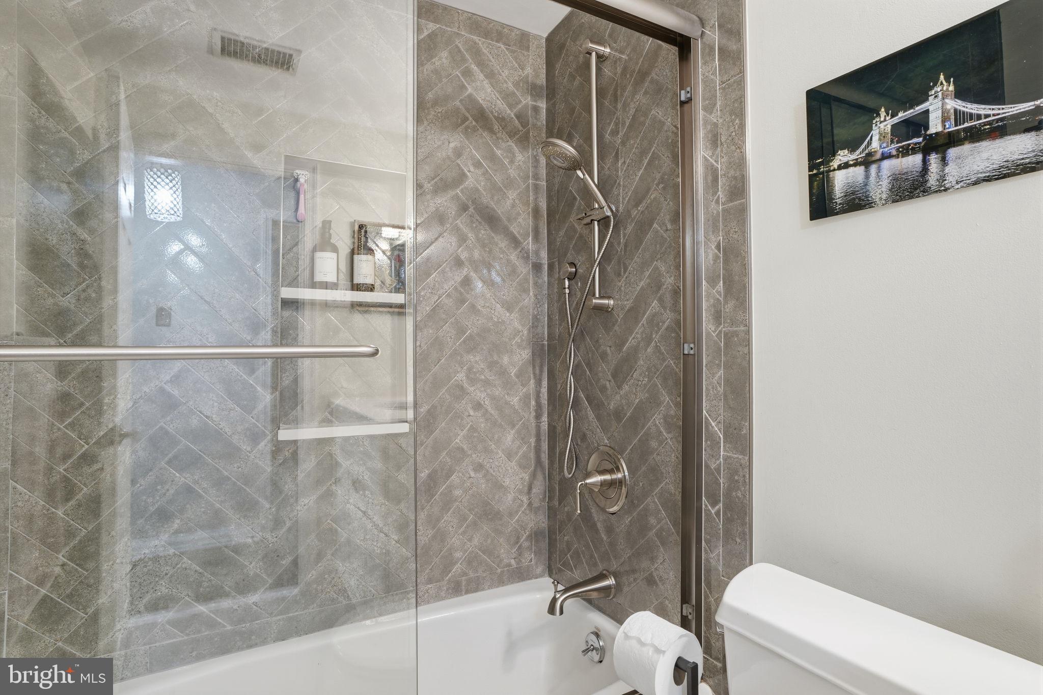 621 River Road Yardley, PA 19067 - Photo 34 of 75 a bathroom with a shower and a toilet sink