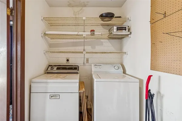an aerial view of a houses with outdoor space