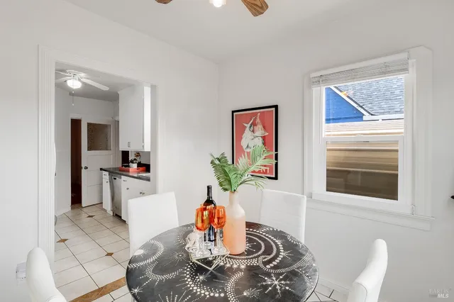 a kitchen with sink and cabinets