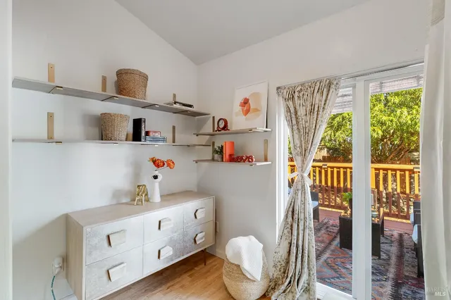 a white toilet sitting next to a bathroom sink and tub