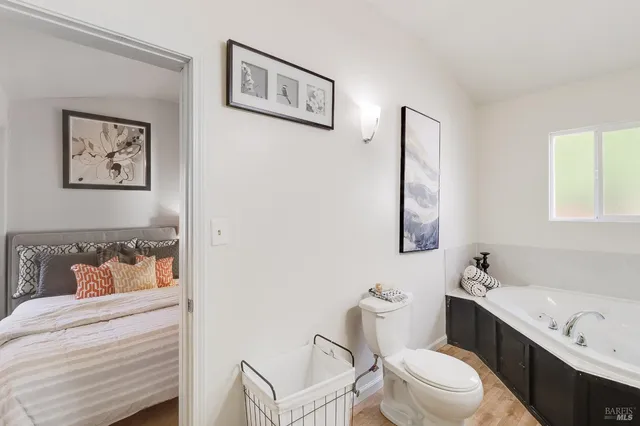 a bathroom with a toilet and a sink