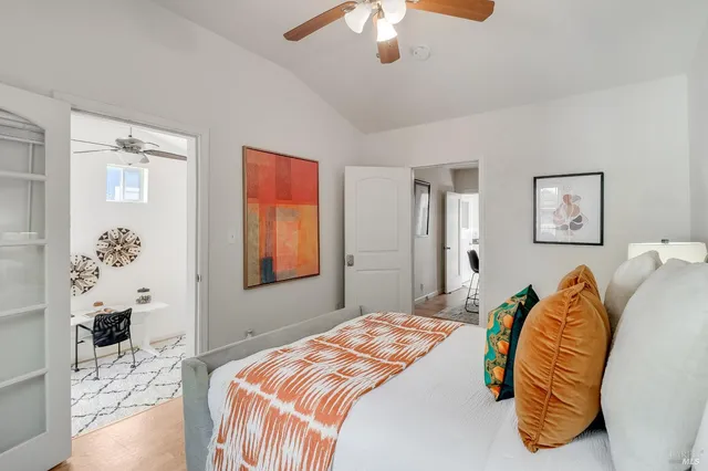 a backyard of a house with outdoor seating