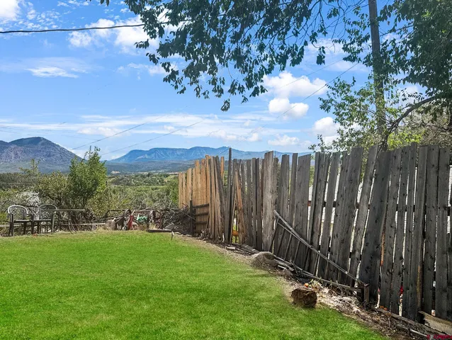 a view of a yard with an outdoor space