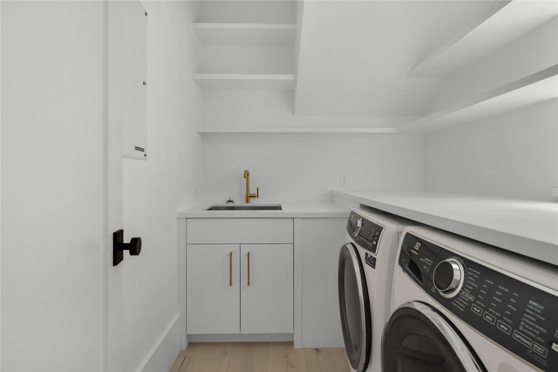 855 Sandfly Lane Vero Beach, FL 32963 - Photo 14 of 35 a utility room with dryer and washer