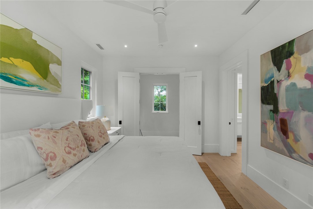 855 Sandfly Lane Vero Beach, FL 32963 - Photo 15 of 35 a spacious bedroom with a bed and a couch