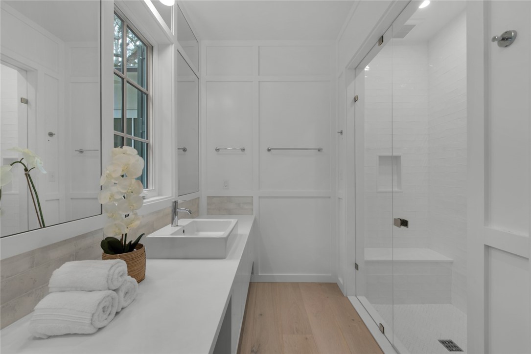 855 Sandfly Lane Vero Beach, FL 32963 - Photo 18 of 35 a bathroom with a tub sink and mirror