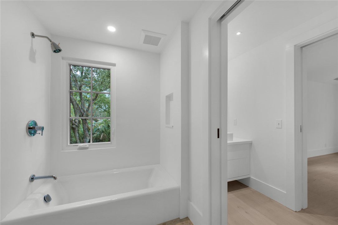 855 Sandfly Lane Vero Beach, FL 32963 - Photo 25 of 35 a bathroom with a bathtub and shower