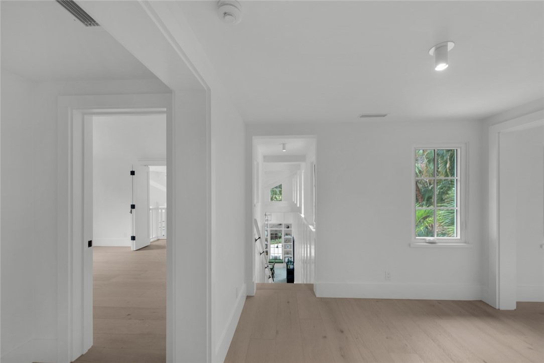 855 Sandfly Lane Vero Beach, FL 32963 - Photo 26 of 35 an empty room with windows and closet