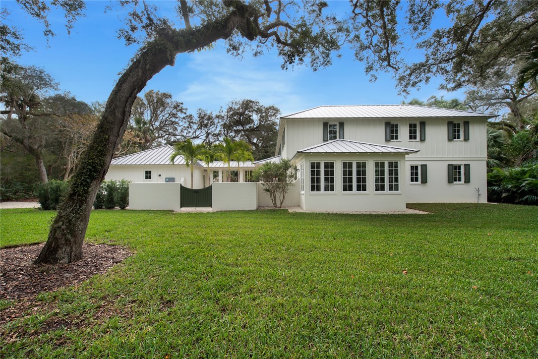 855 Sandfly Lane Vero Beach, FL 32963 - Photo 35 of 35 a view of a house with backyard and garden