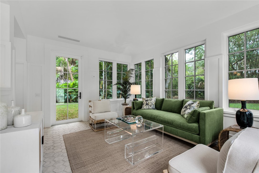855 Sandfly Lane Vero Beach, FL 32963 - Photo 5 of 35 a living room with furniture and a large window