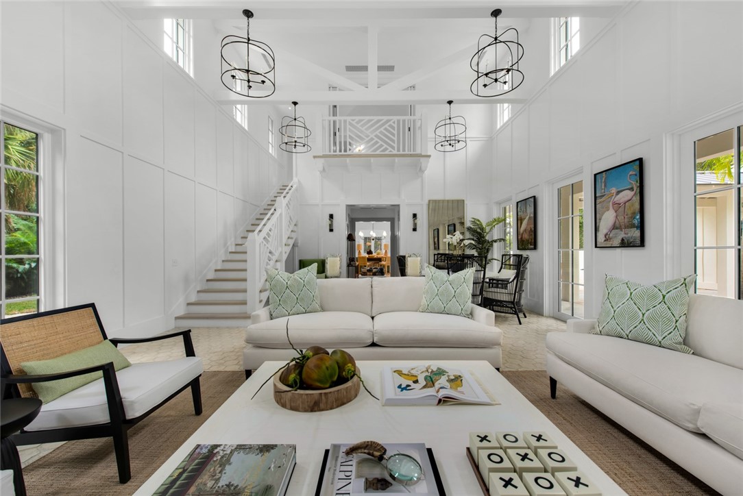 855 Sandfly Lane Vero Beach, FL 32963 - Photo 8 of 35 a living room with furniture kitchen view and a chandelier