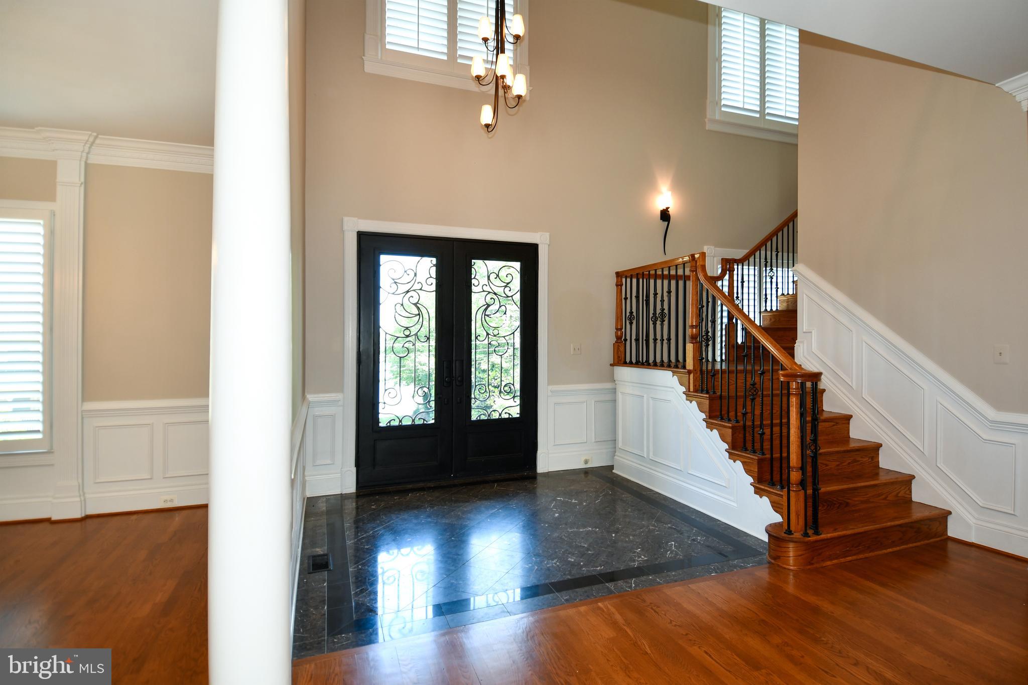 7808 Southdown Road Alexandria, VA 22308 - Photo 31 of 99 a view of entryway and hall with wooden floor
