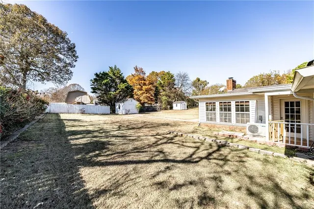 a view of house with outdoor space