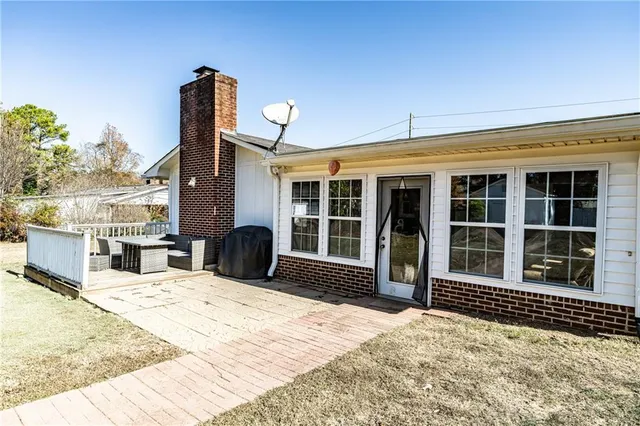 a view of a lounge chairs in front of house