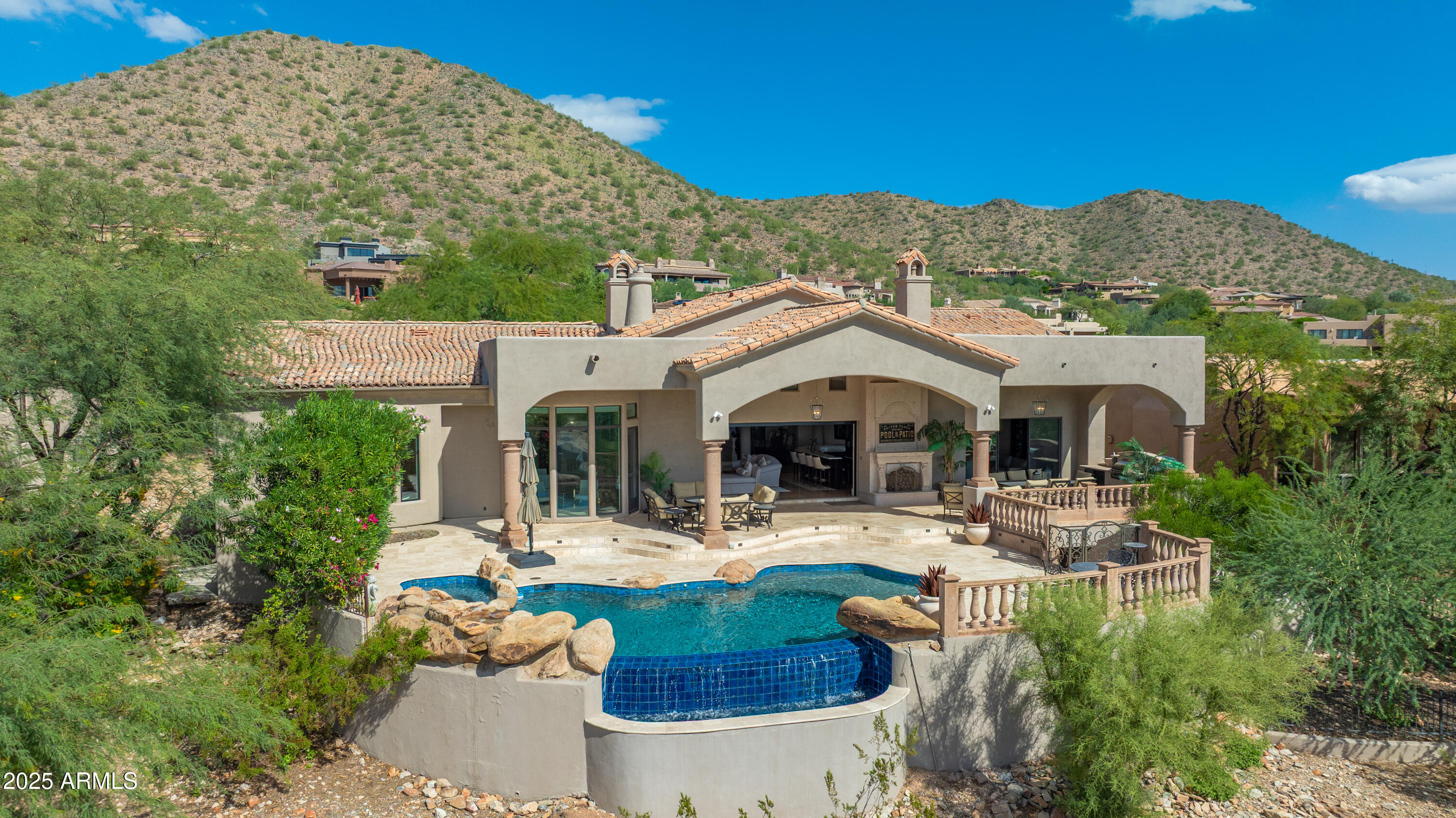 a view of a house with outdoor space and sitting area
