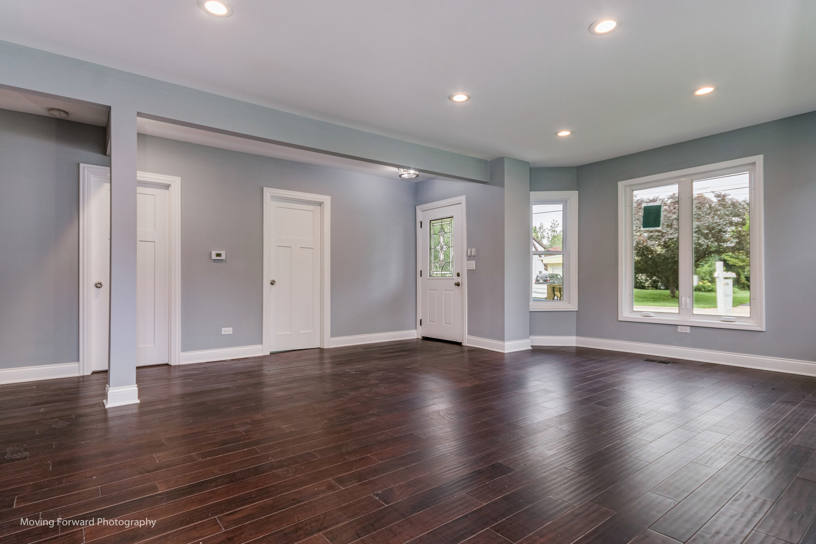 473 East Elm Street Sycamore, IL 60178 - Photo 11 of 53 a view of an empty room with wooden floor and a window