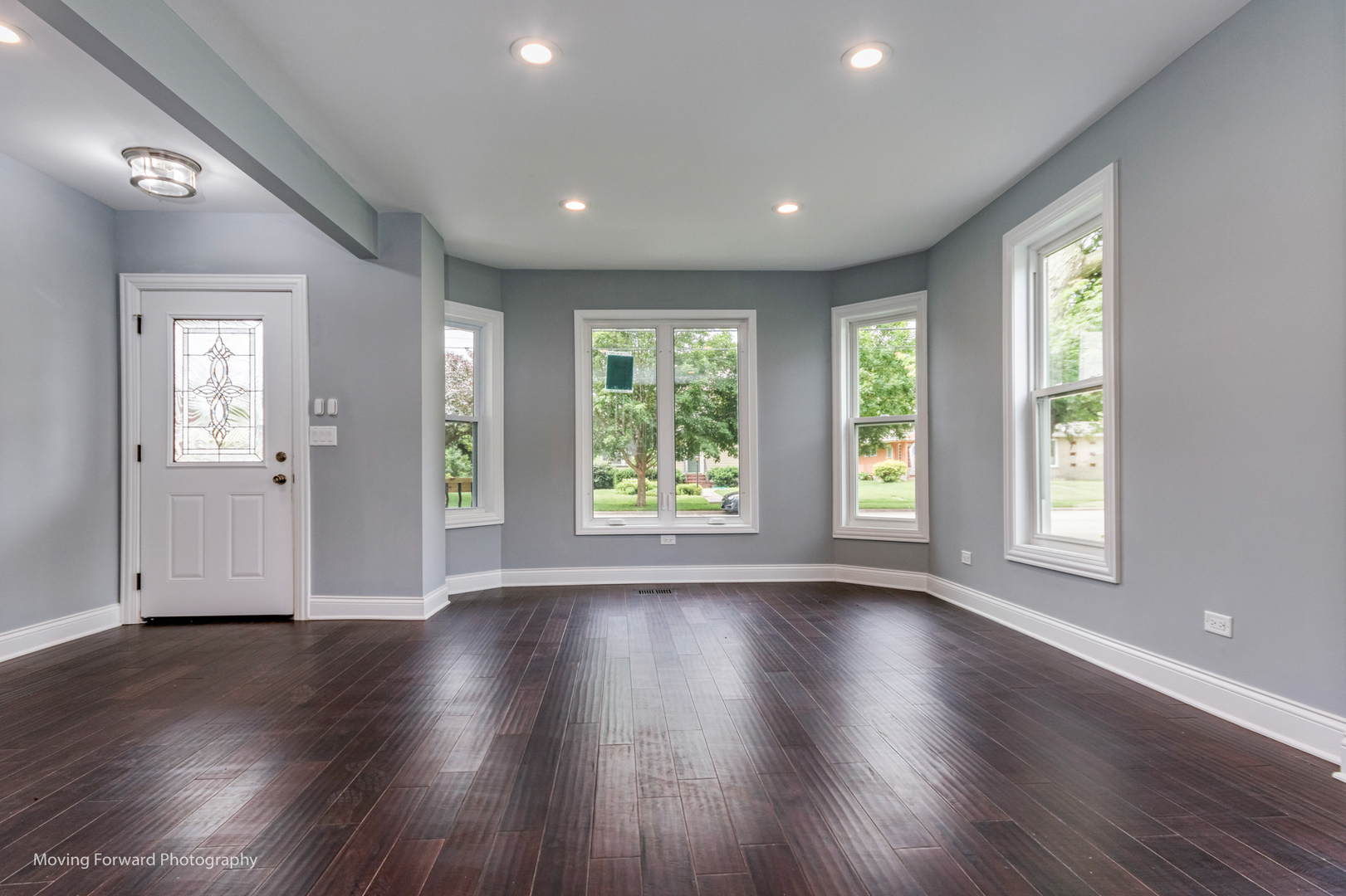 473 East Elm Street Sycamore, IL 60178 - Photo 12 of 53 a view of an empty room with wooden floor and a window