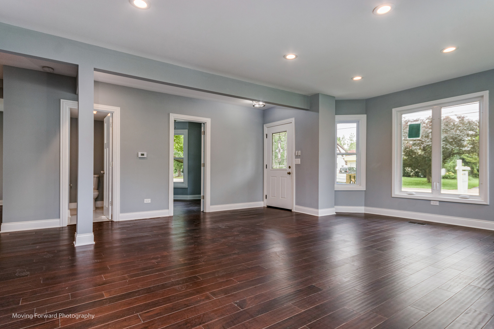 473 East Elm Street Sycamore, IL 60178 - Photo 13 of 53 a view of an empty room with wooden floor and a window